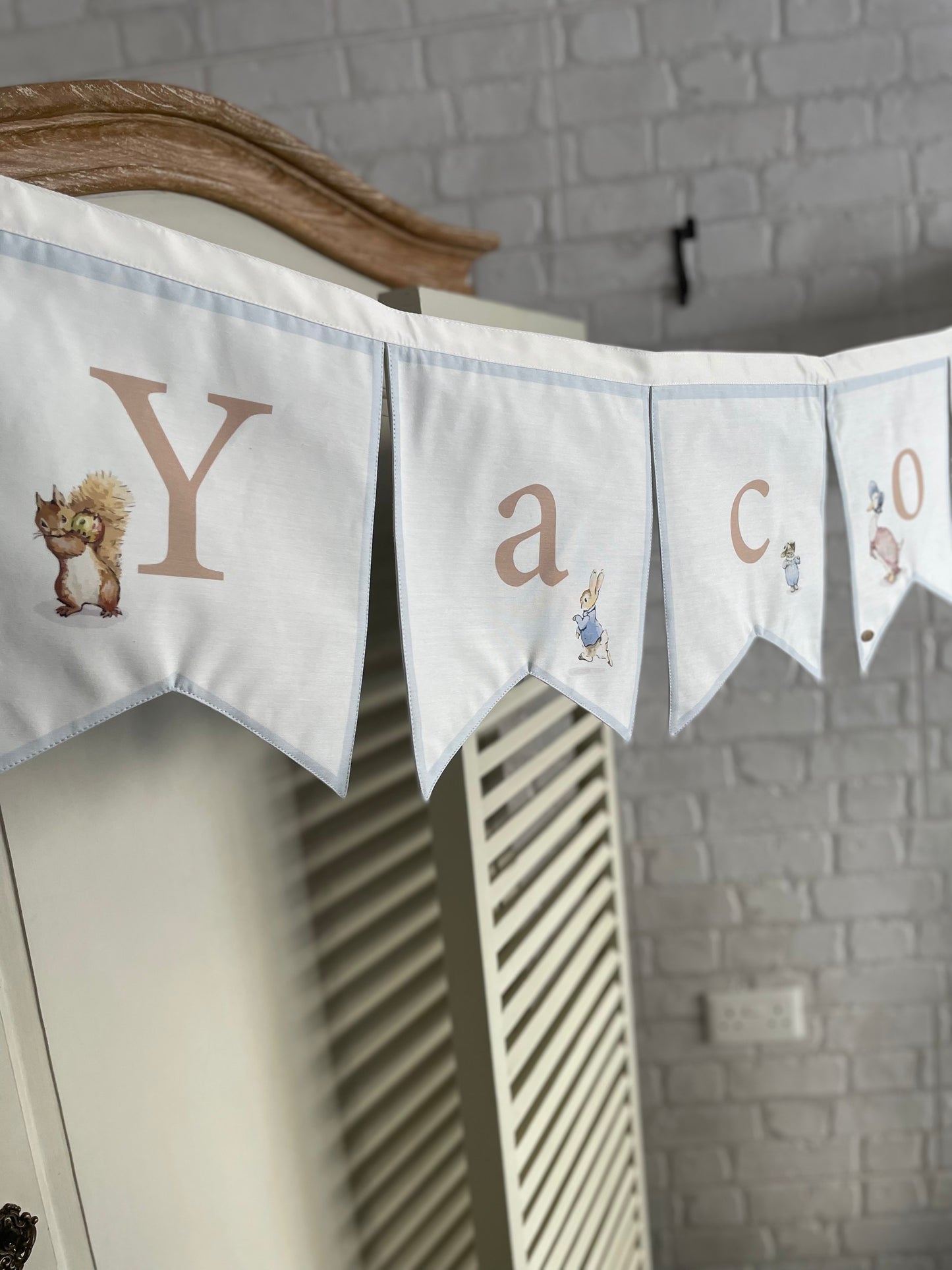 زخرفة العلم - تعليقة الأعلام